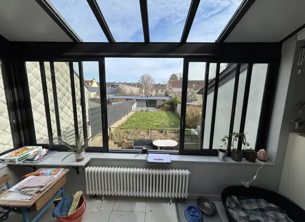 Remplacement d'une baie posée sur muret par une baie coulissante vitrée